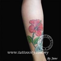 Tatuaje de una flor y un conejo