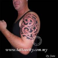 Tattoo de una espiral maorí