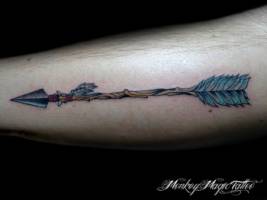 Tatuaje de una flecha rústica