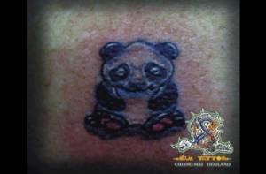 Tatuaje de un pequeño oso panda