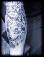 Tattoo de una cabeza de lobo