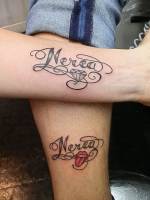 Tatuaje para parejas del nombre Nerea con un diamante y el logo de los rolling stones