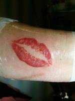 Tatuaje de la marca de un beso