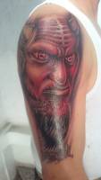 Tatuaje de la cabeza de un demonio rojo