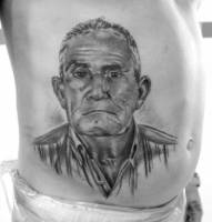 Tatuaje de un retrato de un hombre 