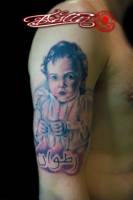 Tatuaje de un retrato de un niño