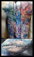 Tatuaje en el brazo de un fénix en llamas, un dragon y pegaso con un tiburón en la parte interior