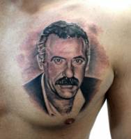 Tattoo retrato en el pecho