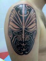 Tatuaje de una mascara tribal
