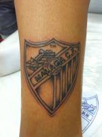 Tatuaje del escudo del Malaga C.F.