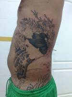 Tatuaje de una geisha bajo un cerezo, aún por terminar