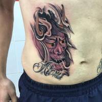Tatuaje de un demonio dentro una ola