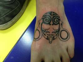 Tatuaje de una cara aborigen