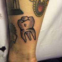 Tatuaje de un diente