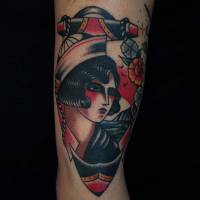 Tatuaje de una chica marinera y un ancla