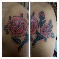 Tatuaje de una rosas con espinas