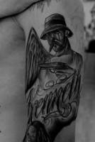 Tattoo de un ángel payaso gangster