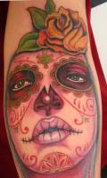 Tattoo de la cara de una calavera mexicana