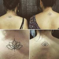 Tattoo de un loto en la espalda