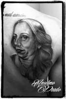 Tatuaje retrato de una señora